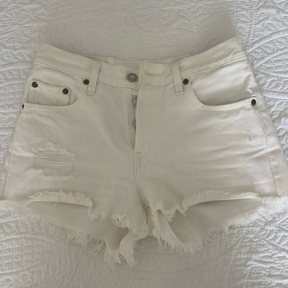 Levi’s white distressed shorts